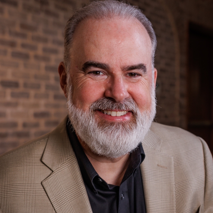 A picture of Alex Kendrick smiling at the camera